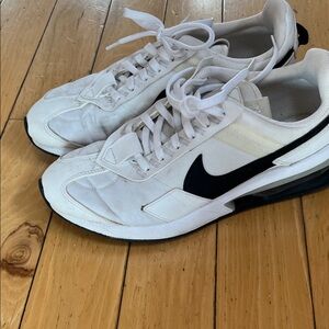 Nike woman’s White and Black Athletic Sneakers